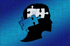 Obrazek symbolizujący zaburzenia neurologiczne, kształt głowy i puzzle