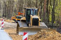 zdjęcie przedstawia maszynę budowlaną