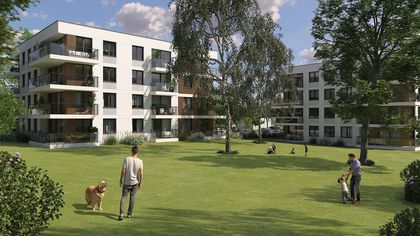 Wizualizacja budynku na ul. Frontowej. Wokół budynku znajdują się drzewa.