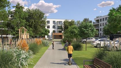 Wizualizacja budynku na ul. Frontowej. Wokół budynku znajdują się drzewa oraz samochody.