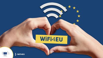 Grafika - dłonie ułożone w kształt serca i symbol połączenia wifi