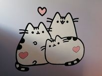 OsrodekJPII remont 2 Trzy biało-czarne kotki z serduszkami namalowane na różowej ścianie