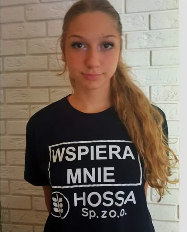 Zawodniczka w koszulce promującej akcję Wspiera mnie Hossa